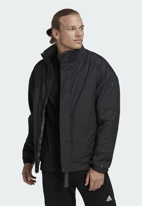 adidas jacke schwarz mit schriftzug auf dem rücken|adidas Sportswear Regenjacke / wasserabweisende Jacke.